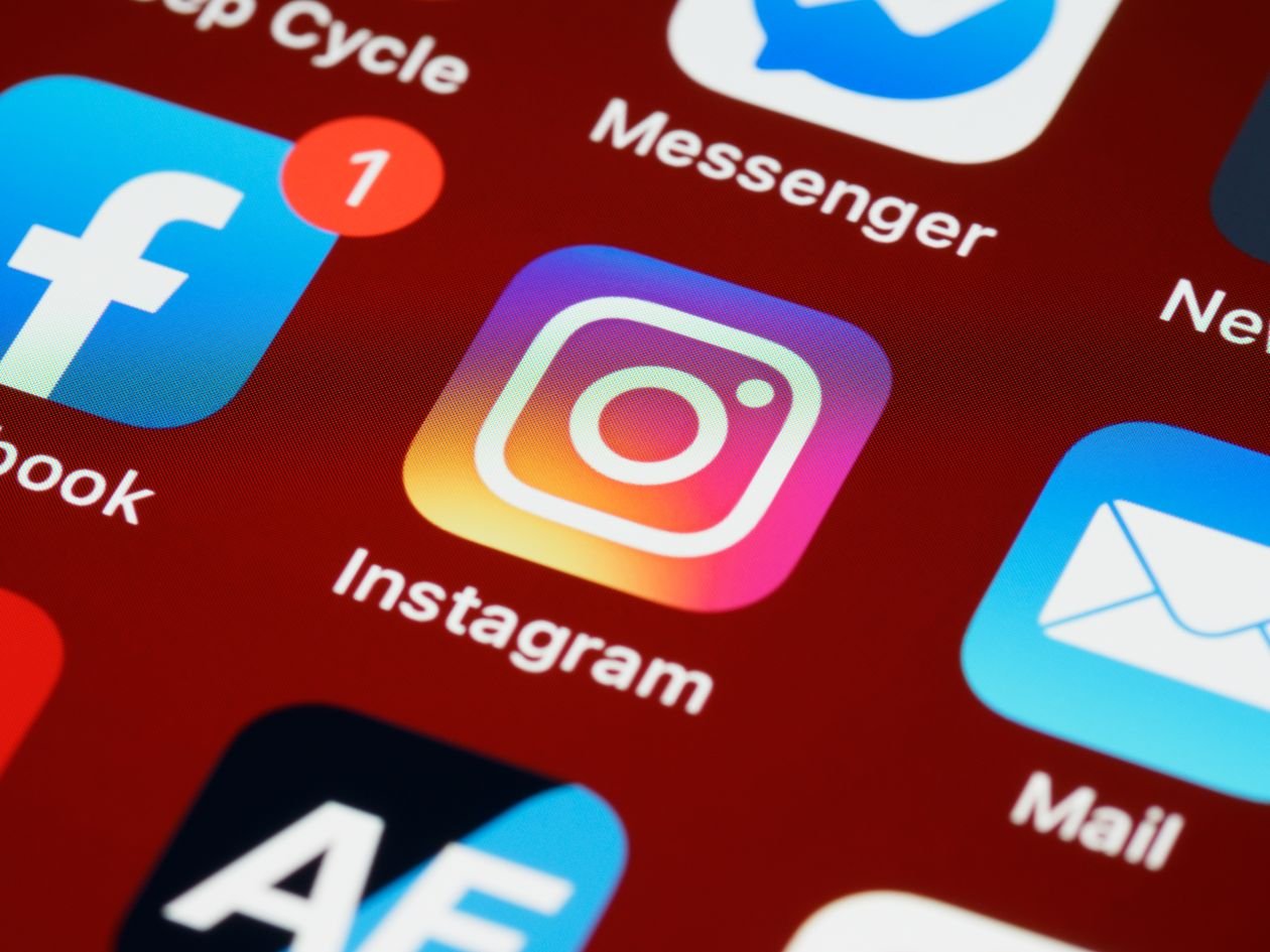 Vibrant close-up of popular social media app icons on a smartphone screen